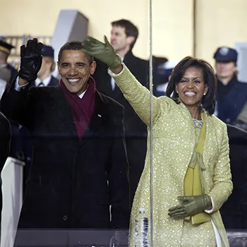 Barack and Michelle Obama waving