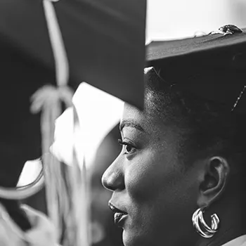 two women graduating from college